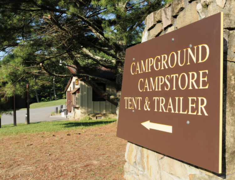 Sign pointing the way to the campground store