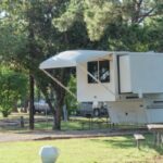 RV campground with plenty of trees for both tent camping and RV sites in Texas, America