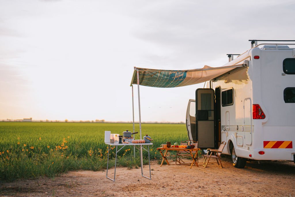 RV park by a field at sunset