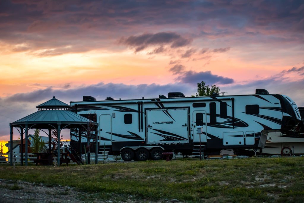 Campsite in RV park at sunset
