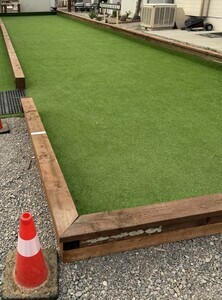 Bocce Ball Court beside clubhouse, as well as a Corn Hole area