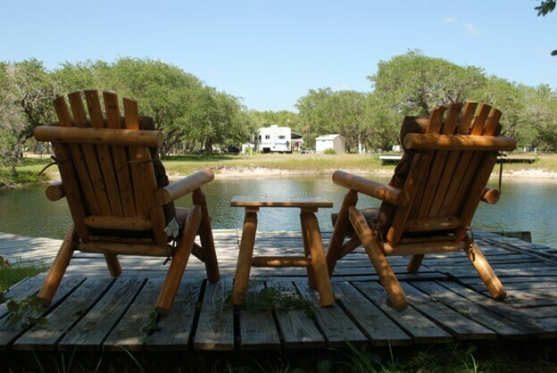 Adirondack Chairs On Pond
