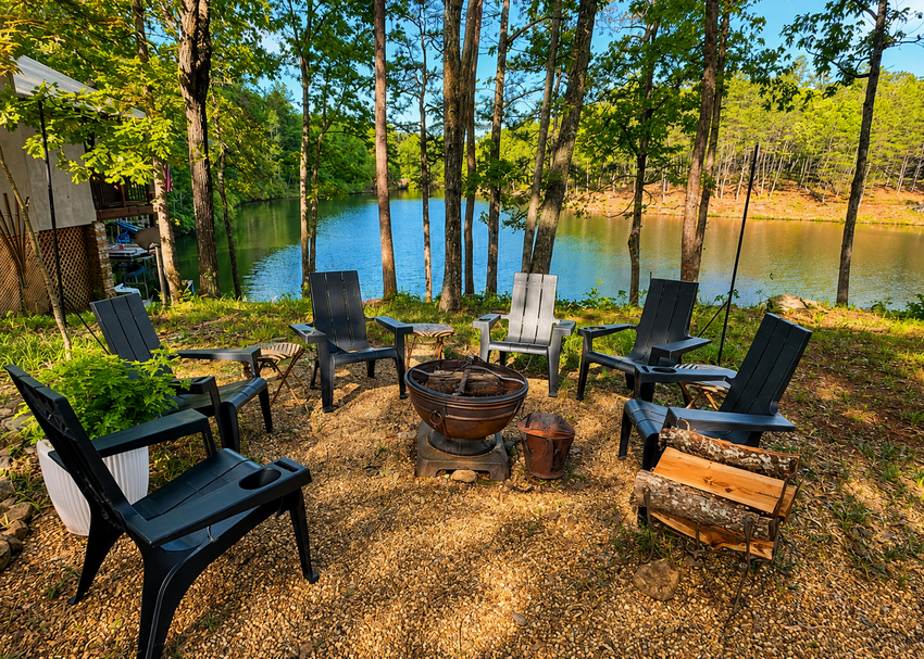 Our cabin guest enjoy a campfire overlooking the lake